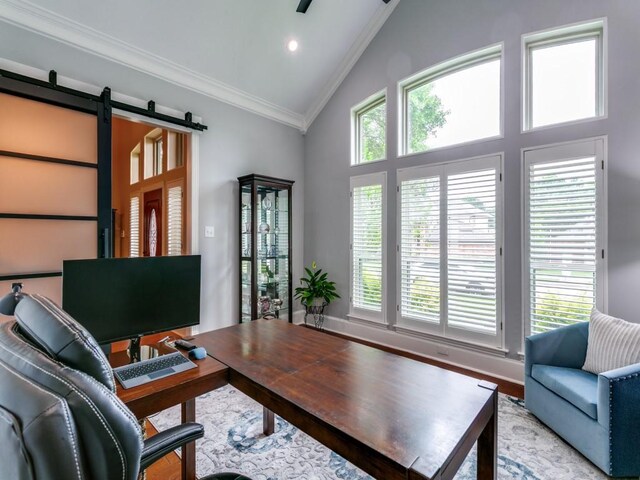 office with a barn door, light wood-style floors, high vaulted ceiling, recessed lighting, and ornamental molding