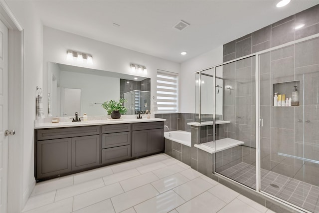 full bathroom with tile patterned floors, double vanity, a stall shower, visible vents, and a garden tub