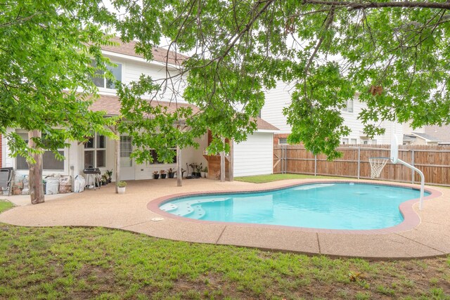 view of pool featuring fence, a patio area, and a fenced in pool