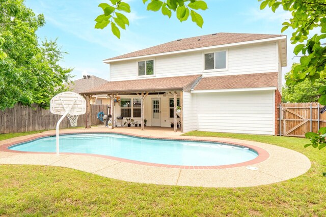view of pool featuring a fenced backyard, a fenced in pool, a gate, a patio area, and a lawn