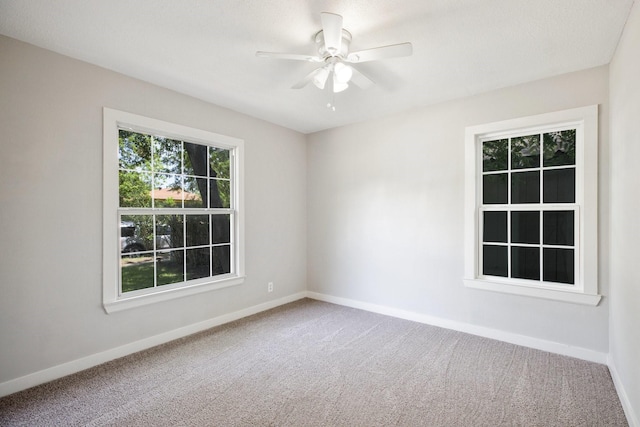 2224 Tisinger Ave, Dallas, TX 75228 - unfurnished room with a ceiling fan, baseboards, and carpet floors