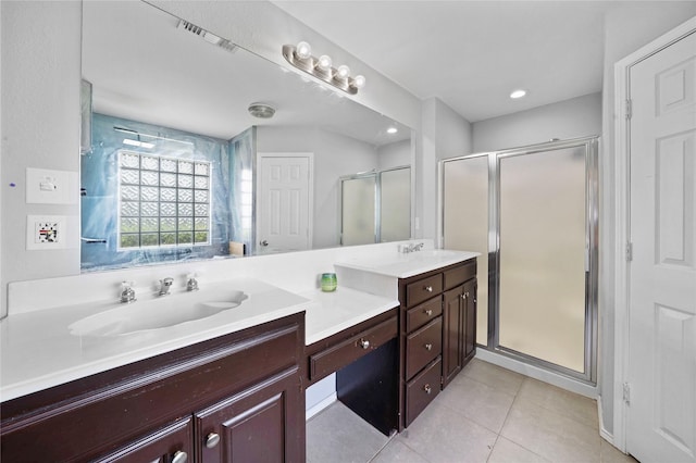 620 Linda Dr, Burleson, TX 76028 - full bath with tile patterned floors, a sink, a shower stall, and double vanity