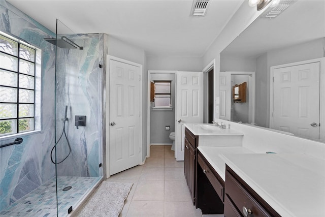 620 Linda Dr, Burleson, TX 76028 - full bathroom featuring tile patterned flooring, visible vents, toilet, vanity, and a marble finish shower