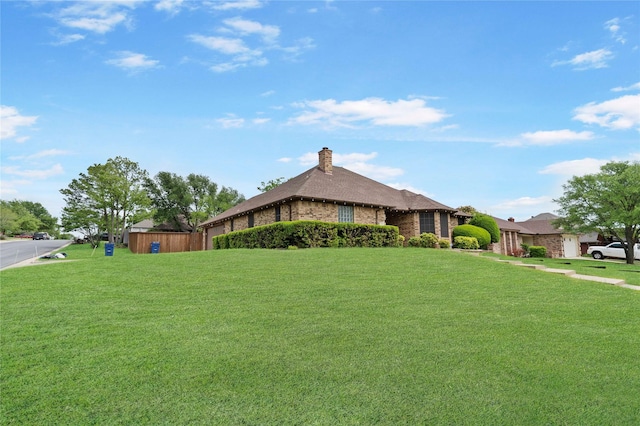 620 Linda Dr, Burleson, TX 76028 - view of side of property with a lawn, brick siding, and a chimney