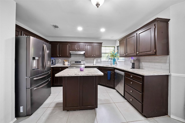 620 Linda Dr, Burleson, TX 76028 - kitchen with decorative backsplash, appliances with stainless steel finishes, a sink, and visible vents