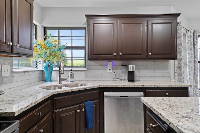 620 Linda Dr, Burleson, TX 76028 - kitchen featuring a sink, dark brown cabinetry, backsplash, light stone countertops, and dishwasher