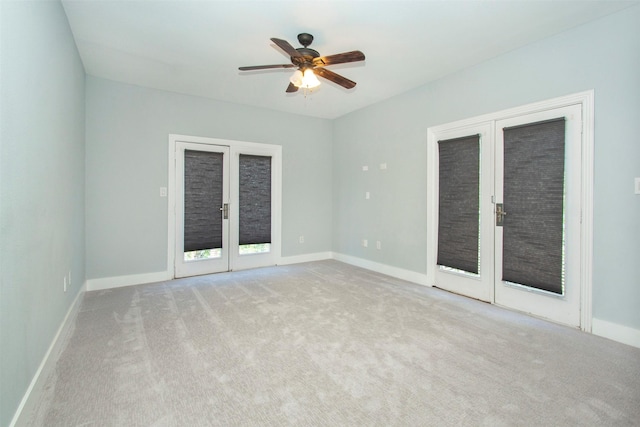 1323 Saint Joseph St Unit 17, Dallas, TX 75204 - empty room featuring french doors, carpet, a ceiling fan, and baseboards