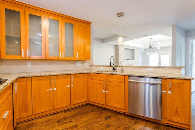 1323 Saint Joseph St Unit 17, Dallas, TX 75204 - kitchen featuring dishwasher, a sink, backsplash, a peninsula, and brown cabinetry