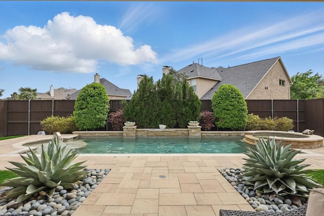 view of pool with an in ground hot tub, a fenced in pool, and a fenced backyard