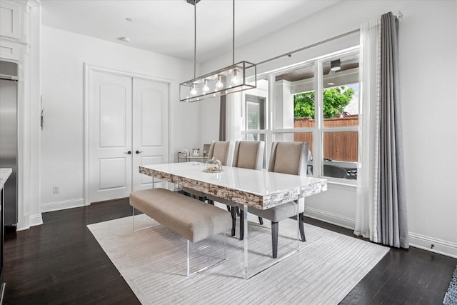 13508 Balint Ln, Frisco, TX 75035 - dining space with dark wood finished floors and baseboards