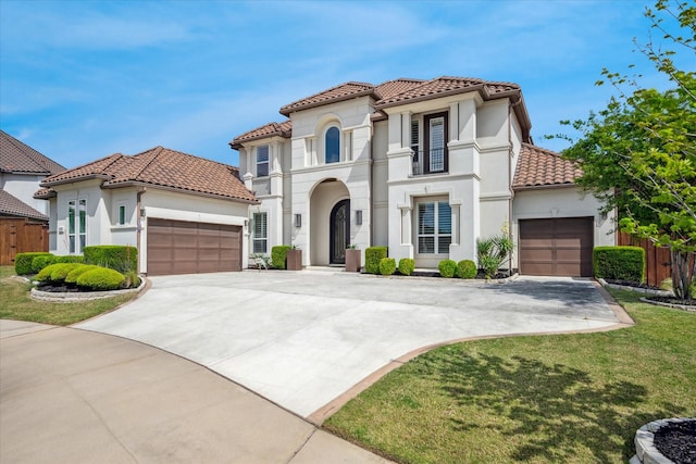 13508 Balint Ln, Frisco, TX 75035 - mediterranean / spanish-style house with concrete driveway, a tiled roof, an attached garage, fence, and stucco siding
