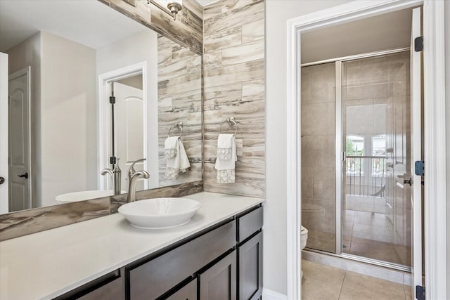 13508 Balint Ln, Frisco, TX 75035 - full bath with a shower stall, toilet, vanity, and tile patterned floors