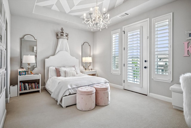 13508 Balint Ln, Frisco, TX 75035 - bedroom with carpet floors, a tray ceiling, baseboards, a notable chandelier, and visible vents