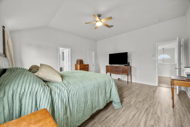 5712 Goldfinch Way, Dallas, TX 75249 - bedroom featuring visible vents, a ceiling fan, wood finished floors, and vaulted ceiling