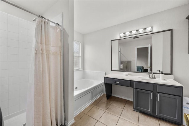 5712 Goldfinch Way, Dallas, TX 75249 - full bathroom with a tile shower, a tub with jets, vanity, tile patterned floors, and ensuite bath
