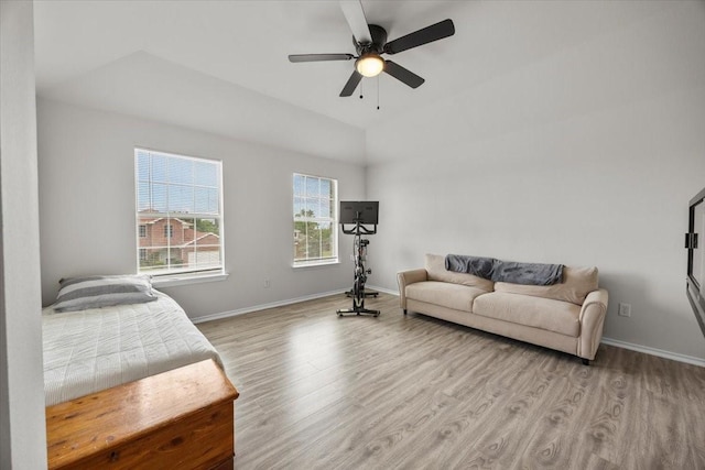 5712 Goldfinch Way, Dallas, TX 75249 - living room with baseboards, a ceiling fan, and light wood-type flooring