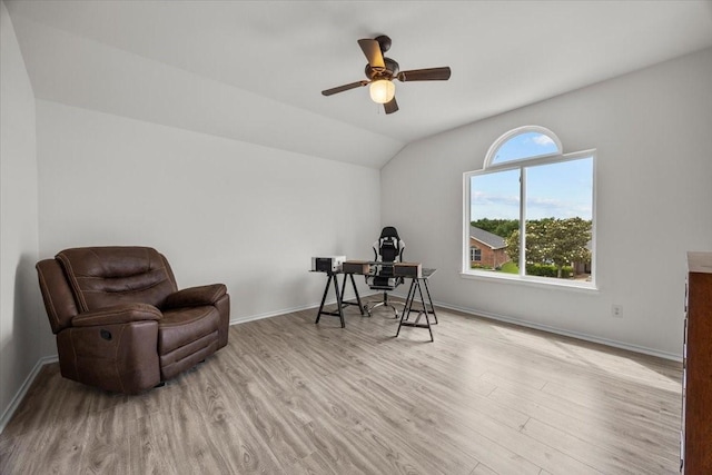 5712 Goldfinch Way, Dallas, TX 75249 - living area with baseboards, ceiling fan, vaulted ceiling, and wood finished floors