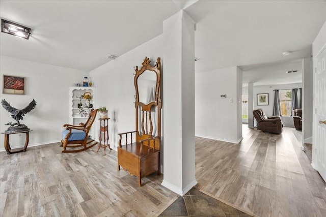 5712 Goldfinch Way, Dallas, TX 75249 - interior space featuring baseboards and wood finished floors