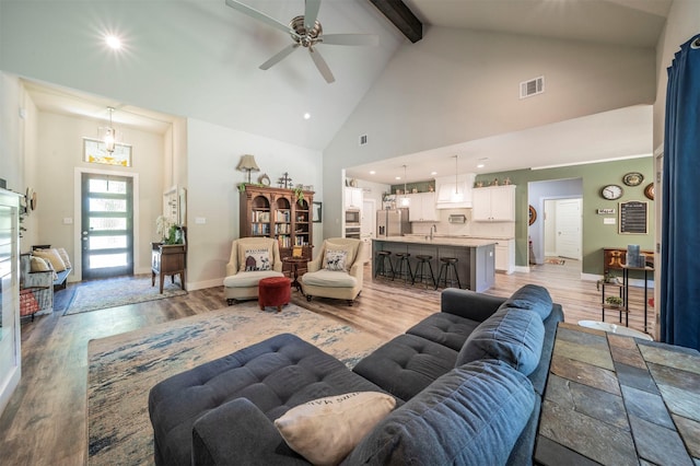 2033 Antler Loop, Poolville, TX 76487 - living room with high vaulted ceiling, light wood finished floors, ceiling fan, beam ceiling, and recessed lighting