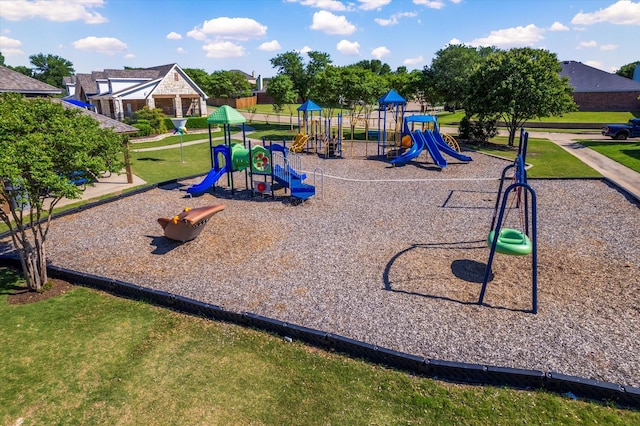 community playground featuring a yard
