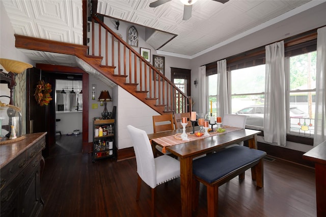 dining room with a ceiling fan, dark wood-type flooring, stairway, and a healthy amount of sunlight