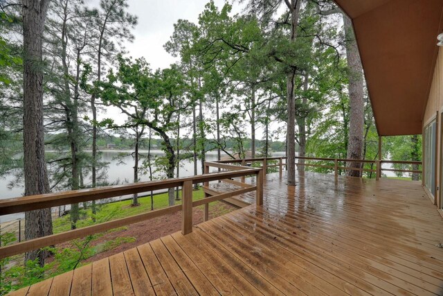 deck featuring a water view