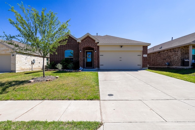 view of front of property featuring an attached garage, brick siding, a front yard, and concrete driveway