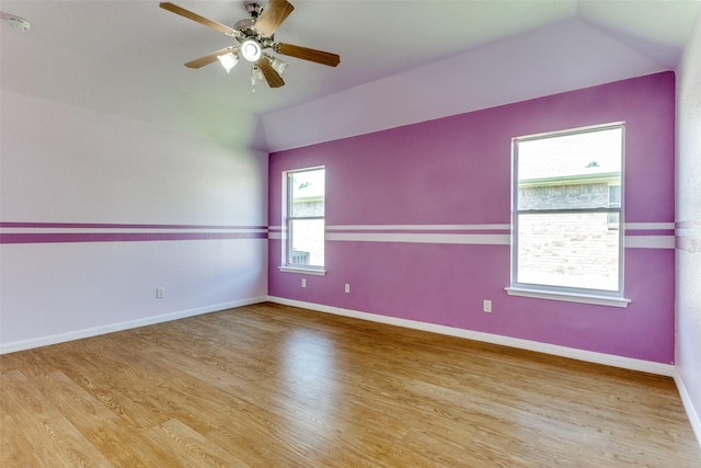 608 Piper Dr, Saginaw, TX 76179 - unfurnished room with vaulted ceiling, a ceiling fan, baseboards, and wood finished floors
