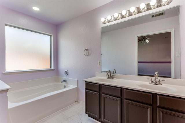 608 Piper Dr, Saginaw, TX 76179 - full bath with marble finish floor, a garden tub, a sink, and visible vents