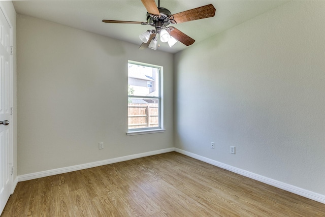 608 Piper Dr, Saginaw, TX 76179 - empty room featuring light wood finished floors, baseboards, and ceiling fan