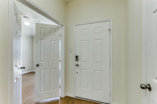 608 Piper Dr, Saginaw, TX 76179 - entrance foyer with wood finished floors, baseboards, and ceiling fan