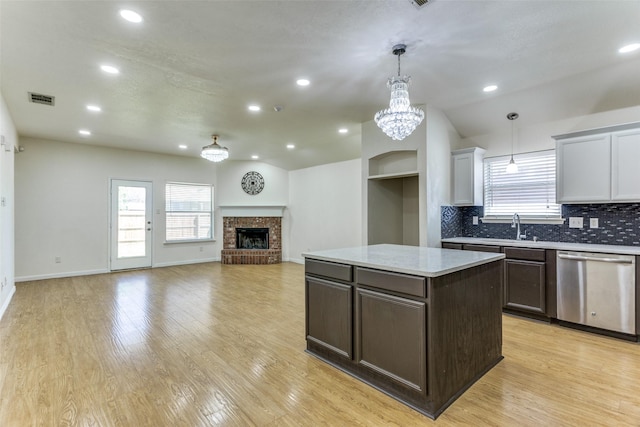 608 Piper Dr, Saginaw, TX 76179 - kitchen with dishwasher, visible vents, a notable chandelier, and a healthy amount of sunlight