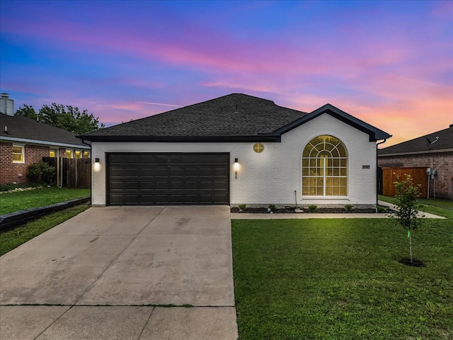 single story home with fence, concrete driveway, a garage, and brick siding