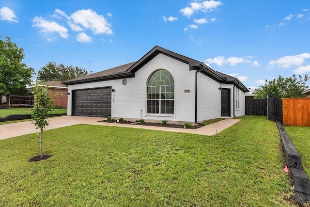 ranch-style home featuring concrete driveway, fence, a front lawn, and a garage