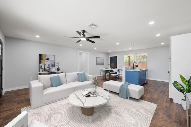 1124 Faulkner Ln, Waco, TX 76704 - living area with dark wood-style floors, recessed lighting, baseboards, and ceiling fan