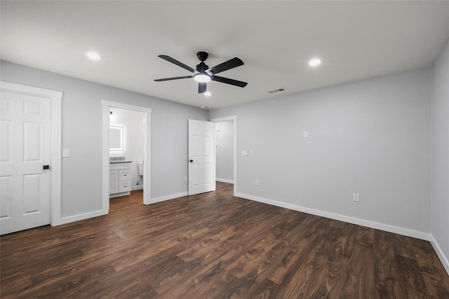 1124 Faulkner Ln, Waco, TX 76704 - unfurnished bedroom with baseboards, recessed lighting, dark wood finished floors, ceiling fan, and connected bathroom