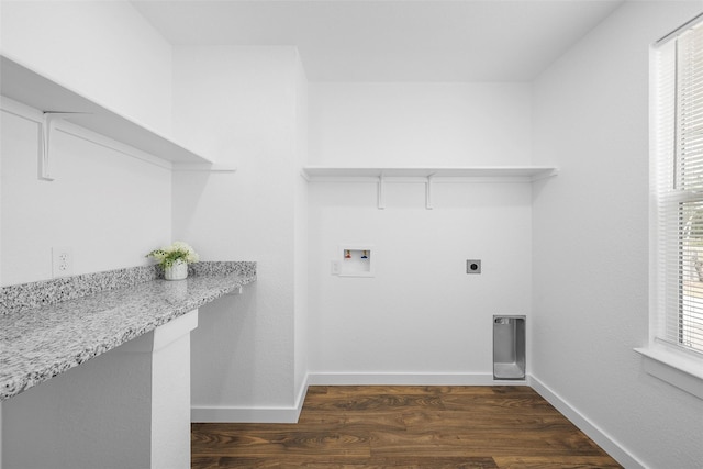 1124 Faulkner Ln, Waco, TX 76704 - washroom featuring hookup for a washing machine, dark wood finished floors, hookup for an electric dryer, and baseboards