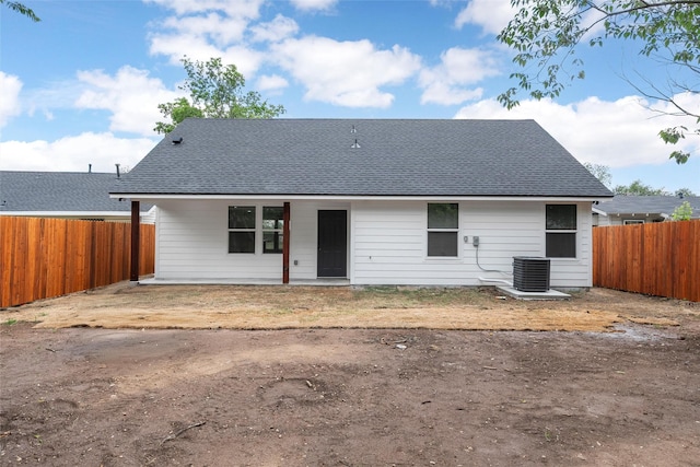1124 Faulkner Ln, Waco, TX 76704 - rear view of property featuring a fenced backyard, cooling unit, and a shingled roof