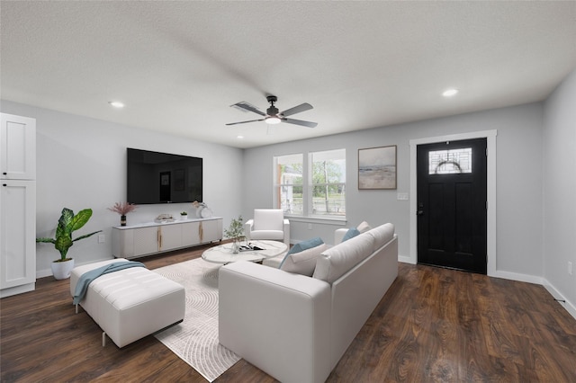 1124 Faulkner Ln, Waco, TX 76704 - living room featuring a ceiling fan, dark wood-style floors, recessed lighting, and baseboards