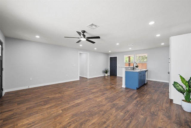 1124 Faulkner Ln, Waco, TX 76704 - unfurnished living room with a sink, recessed lighting, ceiling fan, dark wood-type flooring, and baseboards