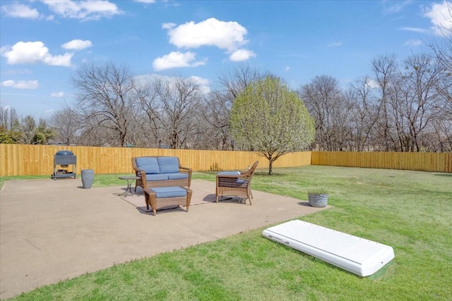 view of patio with a fenced backyard and an outdoor hangout area