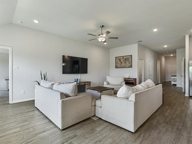 living room featuring recessed lighting, wood finished floors, visible vents, and ceiling fan