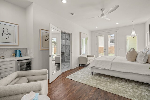 bedroom with access to outside, beverage cooler, dark wood-type flooring, and recessed lighting