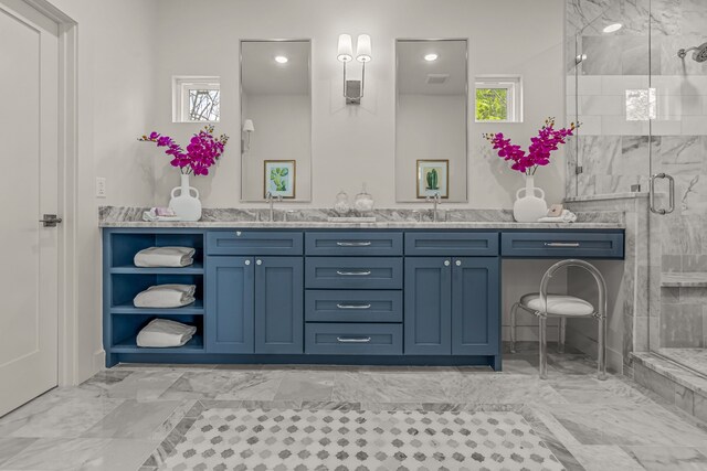 bathroom featuring visible vents, marble finish floor, double vanity, and a stall shower