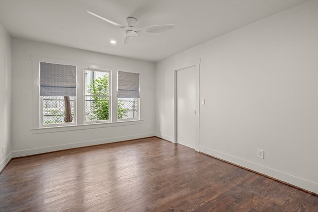 spare room with baseboards, a ceiling fan, wood finished floors, and recessed lighting