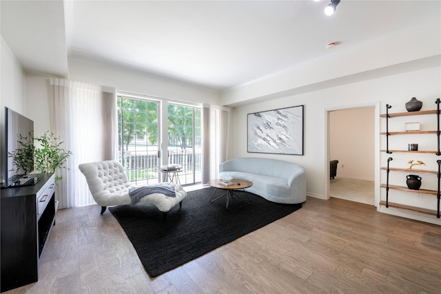 3225 Turtle Creek Blvd Unit 206, Dallas, TX 75219 - living room featuring wood finished floors