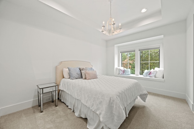 bedroom featuring recessed lighting, baseboards, an inviting chandelier, and light carpet