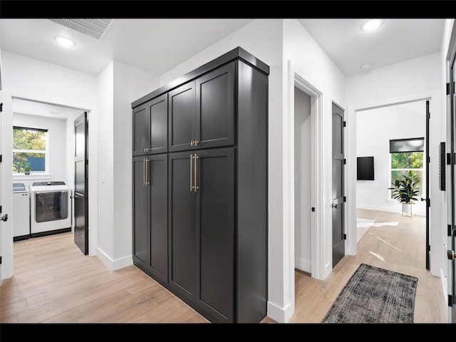 612 Glade Stream Ct, Azle, TX 76020 - corridor featuring light wood-style flooring, washing machine and dryer, baseboards, visible vents, and recessed lighting