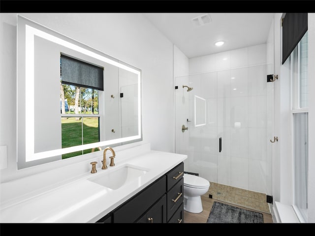612 Glade Stream Ct, Azle, TX 76020 - full bath with toilet, vanity, wood finished floors, and a stall shower