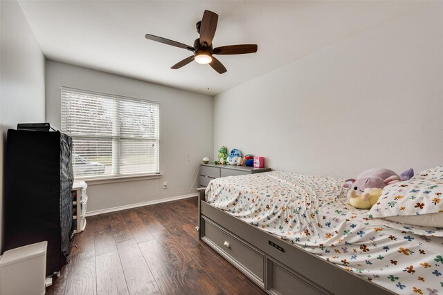 5102 Galaxie Rd, Garland, TX 75044 - bedroom featuring dark wood-style flooring and ceiling fan
